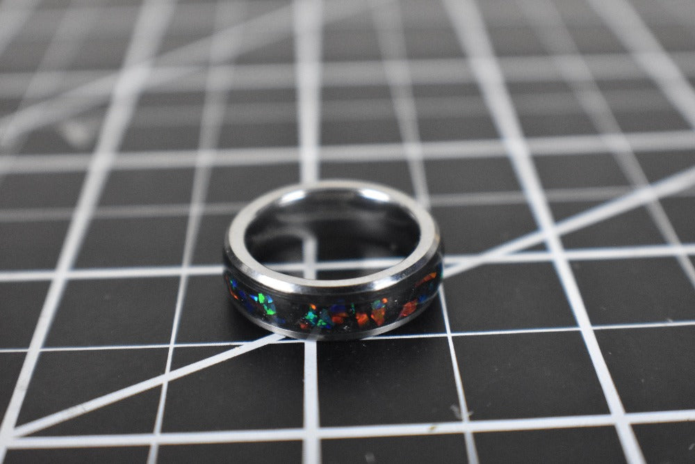 The Supernova Ring: Red and Green Opals with Black Mica Powder